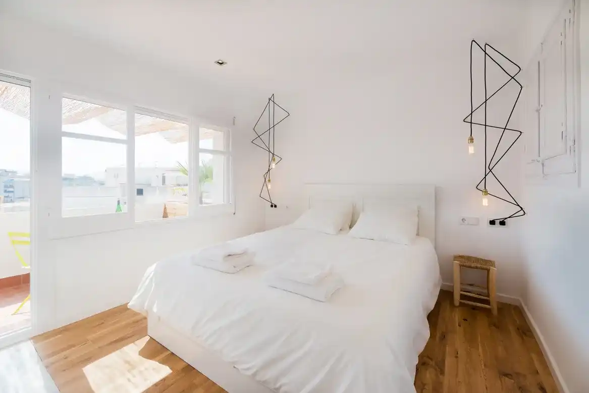 Scandinavian bedroom lighting setup